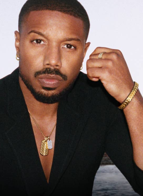 Michael B. Jordan wearing Chevron jewelry.